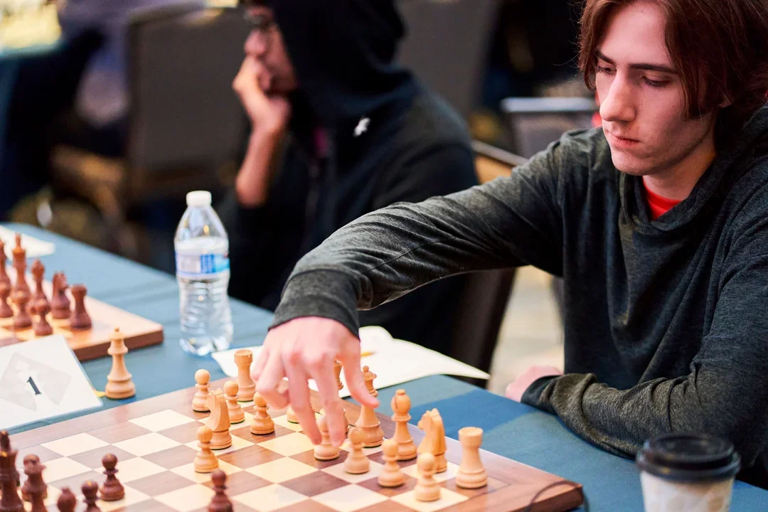Gus Huston playing chess